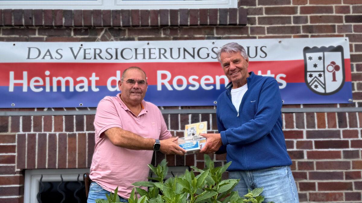 Stefan Breitkopf, Rosenrott, übergibt Spende an Dieter F. Kindermann